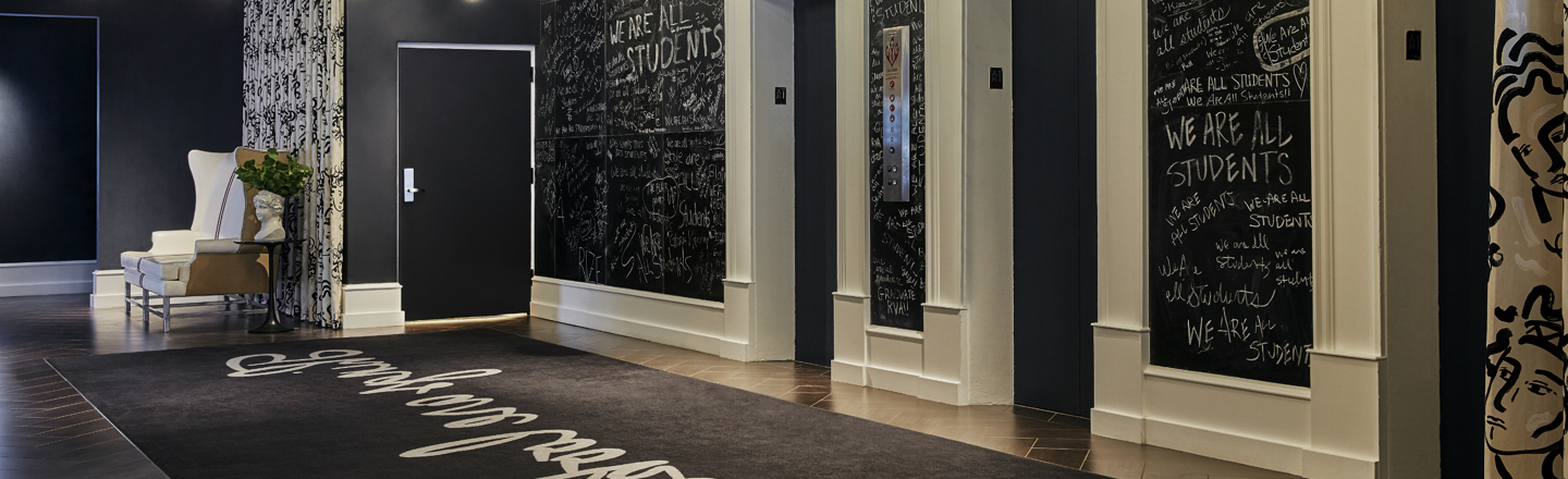 Renovated elevator space, chalkboard painted walls at Graduate Richmond